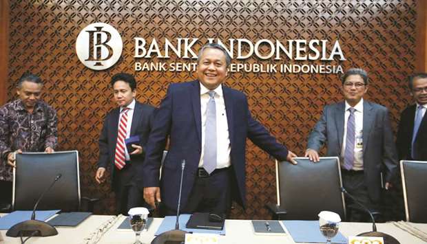 Bank Indonesia governor Perry Warjiyo reacts before a media briefing at the central banku2019s headquarters in Jakarta. u201cThe reason for the rate hike is to maintain the attractiveness of our domestic financial market, in that we want yields to remain attractive despite rising risk premiums and that could trigger inflows,u201d Warjiyo said.