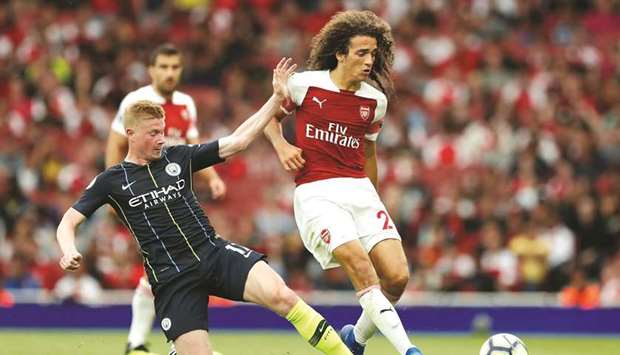 Kevin De Bruyne (left) came off the bench on Sunday in Manchester Cityu2019s 2-0 victory over Arsenal in their opening Premier League match. (Reuters)