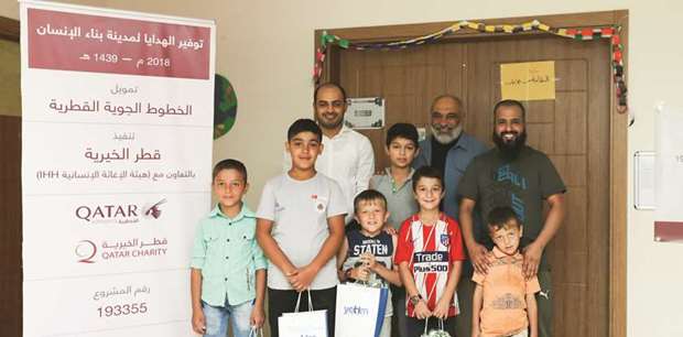 Orphans in the Childrenu2019s Living Centre in the Reyhanli province of Hatay receive toys from Qatar Airways and Qatar Charity.