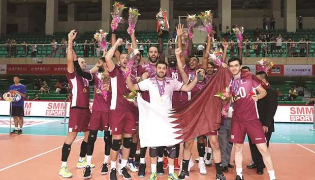 Qatar players celebrate their win in the AVC Cup for Men at the University of Taipei (Tianmu) Gymnasium yesterday.