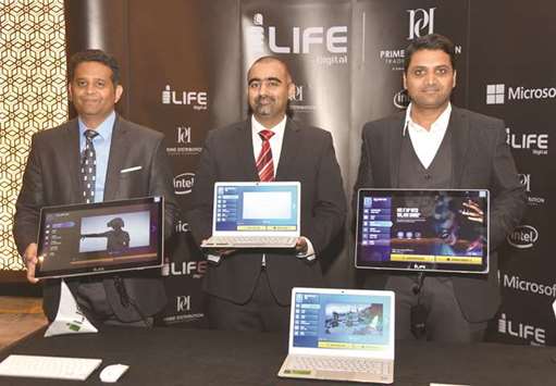 Bhatia flanked by Imran (right) and Patil, I-Life regional manager, with the new devices at the launch ceremony yesterday.