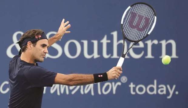 Roger Federer of Switzerland returns a shot to Peter Gojowczyk of Germany on Day 4 of the Western and Southern Open at the Lindner Family Tennis Centre in Mason, Ohio. (Getty Images/AFP)