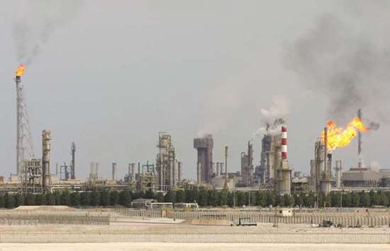This file photo taken on February 1, 2006 shows an oil refinery on the outskirts of Doha. Qataru2019s exports grew 46% year-on-year in July as a result of higher oil prices while imports grew 50%, QNB said in its latest u2018Qatar Monthly Monitor.u2019
