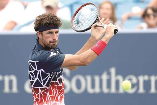 Robin Haase of Netherlands plays a backhand during his win over Alexander Zverev of Germany in Mason, Ohio. (AFP)