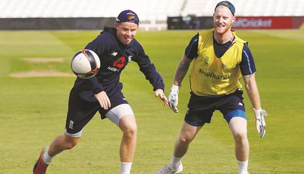Englandu2019s Ben Stokes (right) and Ollie Pope play football during their training session at Trent Bridge, Nottingham, yesterday. (Reuters)