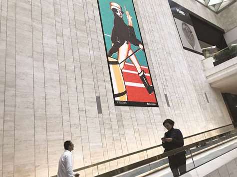 People are seen walking through Iguatemi shopping mall in Sao Paulo, Brazil.