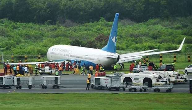 A XiamenAir Boeing 737-800 aircraft is seen after skidding off the runway at the Manila international airport on Friday.