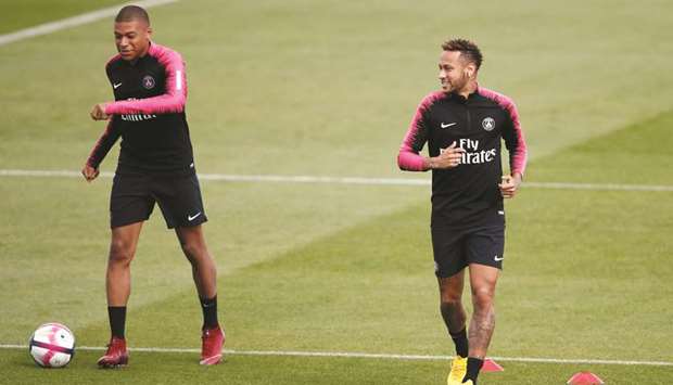 PSGu2019s Neymar and Kylian Mbappe during training yesterday. (Reuters)