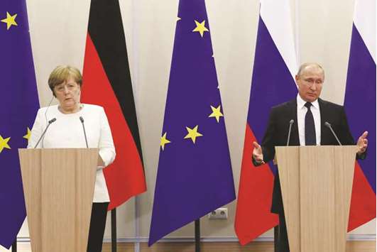 This picture taken on May 18 shows Merkel and Putin following their meeting in the Black Sea resort of Sochi, Russia.