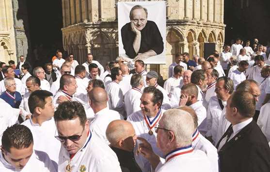 French chefs leave after the memorial service for the late Robuchon at the Saint Pierreu2019s cathedral in Poitiers.