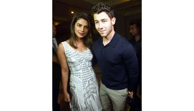 Bollywood actress Priyanka Chopra and Nick Jonas seen at a hotel in Juhu in Mumbai on Friday. The couple solemnised their relationship yesterday with a traditional Indian ceremony.