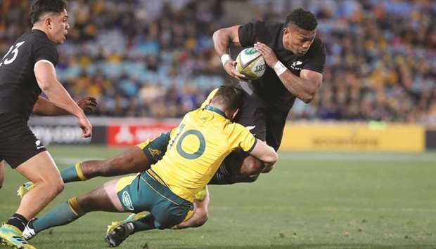 New Zealandu2019s Waisake Naholo (right) in action during the Bledisloe Cup Rugby Championship against Australia in Sydney yesterday. (Reuters)