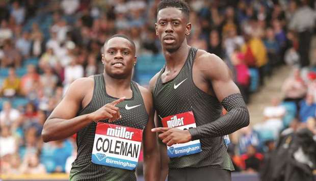 First-placed Christian Coleman of the US and second-placed Reece Prescod of Britain pose after the menu2019s 100m race in Birmingham yesterday. (Reuters)
