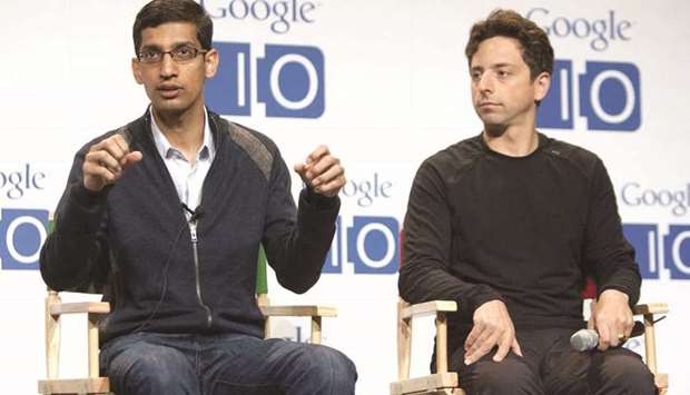 Google chief executive officer Sundar Pichai (left), speaks while Sergey Brin, co-founder of Google, listens during a press conference at the companyu2019s all-hands  meeting in San Francisco. u201cI genuinely do believe we have a positive impact when we engage around the world and I donu2019t see any reason why that would be different in China,u201d Pichai said.