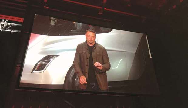 Tesla CEO Elon Musk is shown on a large screen as he unveils the Tesla Semi, his companyu2019s new electric semi truck, during a presentation in Hawthorne, California, on November 16. In casting Saudi Arabiau2019s sovereign wealth fund as a key player to allow him freer rein, heu2019s given them leverage to exert significant influence.