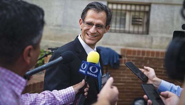 Kenneth Smith, Mexicou2019s chief technical negotiator, speaks to members of the media while arriving for a meeting at the office of the US Trade Representative in Washington, DC, on August 15. American negotiators dropped their demand in the last week to erect barriers against seasonal imports of a wide variety of Mexican farm goods, according to sources.