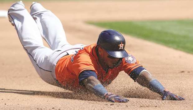 Houston Astros catcher Martin Maldonado slides into third base for a triple during the fifth inning against the Oakland Athletics at Oakland Coliseum. PICTURE: USA TODAY Sports