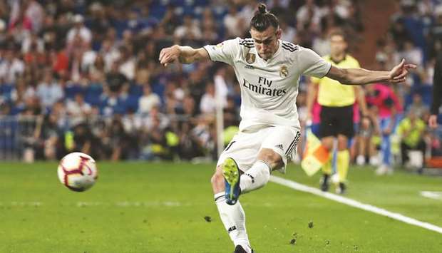Real Madridu2019s Gareth Bale scores during the La Liga match against Getafe in Madrid on Sunday night. (Reuters)
