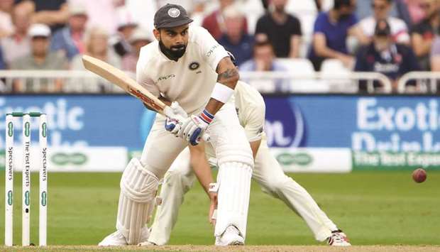 Indiau2019s captain Virat Kohli plays a shot on the third day of the third Test against England in Nottingham yesterday. (AFP)