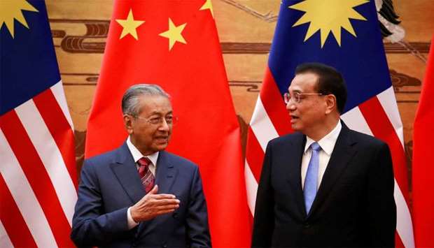 Malaysia's Prime Minister Mahathir Mohamad and China's Premier Li Keqiang