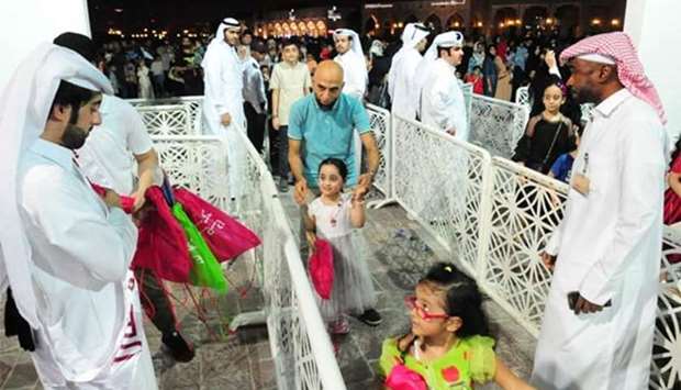 Children receive Eid gifts as part of the celebrations at Katara. PICTURE: Nasar TK