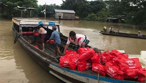 Ooredoo's flood relief efforts in Myanmar.