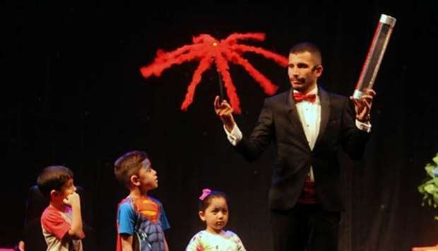 An illusionist engages children on stage at Souq Al Wakrah. PICTURE: Shemeer Rashid.