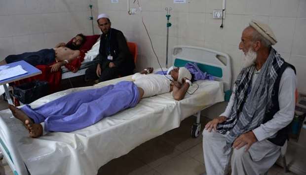 Afghan victims receive treatment at a hospital following a suicide attack in Jalalabad. AFP