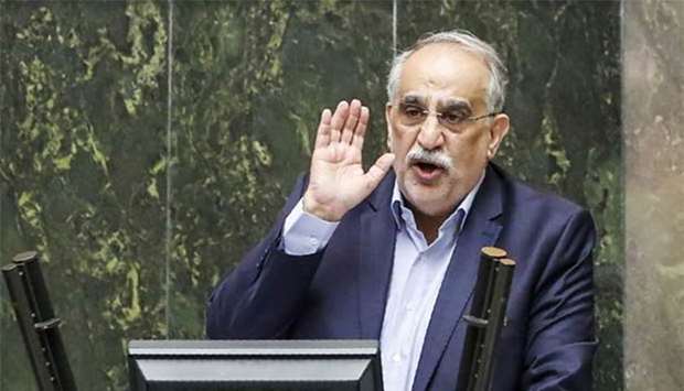 Iran's Economy Minister Masoud Karbasian speaks in parliament in Tehran on Sunday before a vote by lawmakers which saw him impeached.