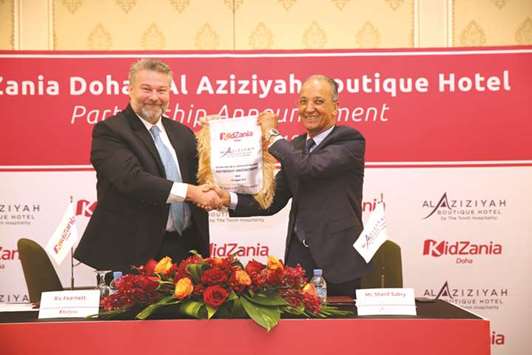 KidZania governor Ric Fearnett and The Torch Hospitality Groupu2019s area general manager Sherif Sabry during the agreement signing.