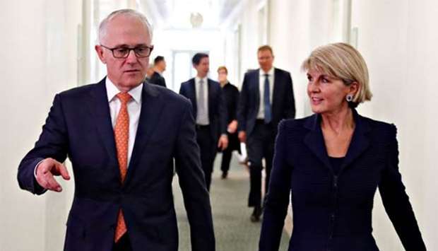 Julie Bishop is seen with Malcolm Turnbull after a party meeting in Canberra on Friday.