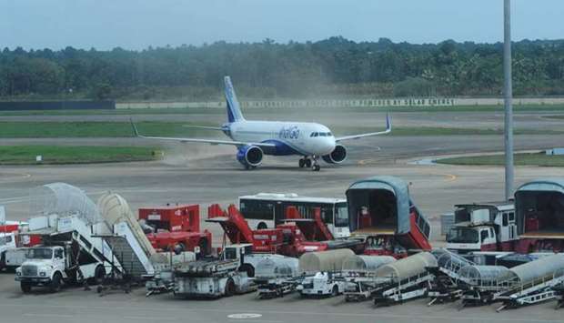 A plane is seen at the taxiway after landing at Kochi's International airport in the Indian state of Kerala