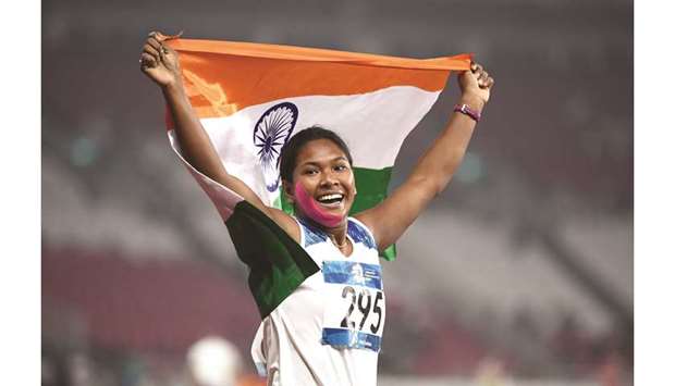 Indiau2019s Swapna Barman celebrates winning the womenu2019s 800m heptathlon event during the 2018 Asian Games in Jakarta yesterday. (AFP)