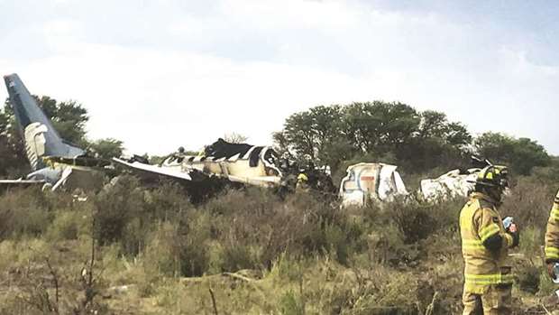 This picture released by Durangou2019s Civil Protection shows the wreckage of the plane that crashed on Tuesday with 97 passengers and four crew on board.