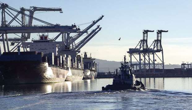 A tug boat heads out to retrieve a container ship at the Port of Oakland in California (file). US consumer spending increased solidly in July, suggesting strong economic growth early in the third quarter, while a measure of underlying inflation hit the Federal Reserveu2019s 2% target for the third time this year.