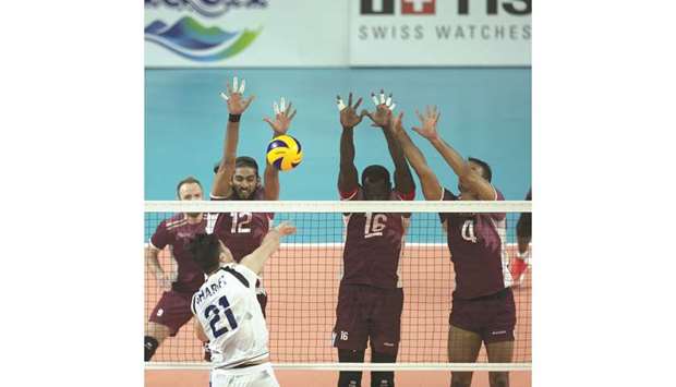Action from the menu2019s volleyball semi-final between Qatar (in maroon) and Iran (in white) during the 2018 Asian Games in Jakarta yesterday.