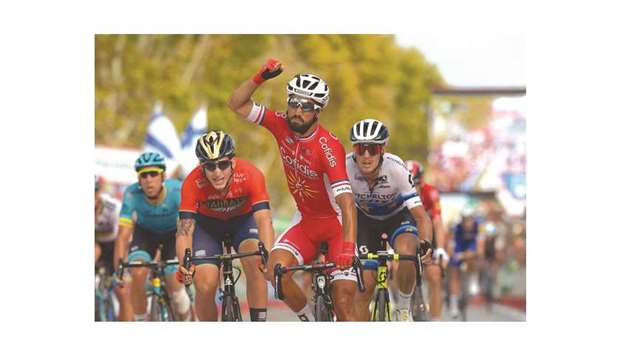 Cofidisu2019 French cyclist Nacer Bouhanni exults as he wins the sixth stage of the 73rd edition of u2018La Vueltau2019, a 155,7 km route from Huercal-Overa to San Javier Mar Menor, yesterday. (AFP)