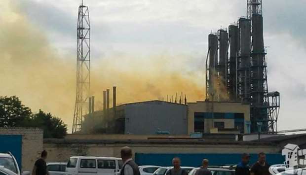 Smoke rises from the plant after the blast