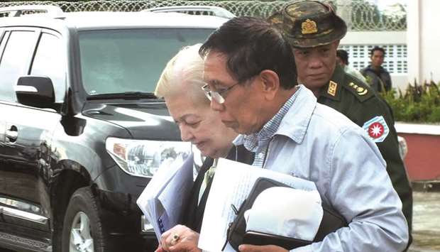 Ambassador Rosario Manalo (left) chairperson of the Independent Commission of Enquiry for Rakhine accompanied by commissioner Aung Tun Thet arrives at Sittwe airport on the commissionu2019s first visit in Rakhine state.