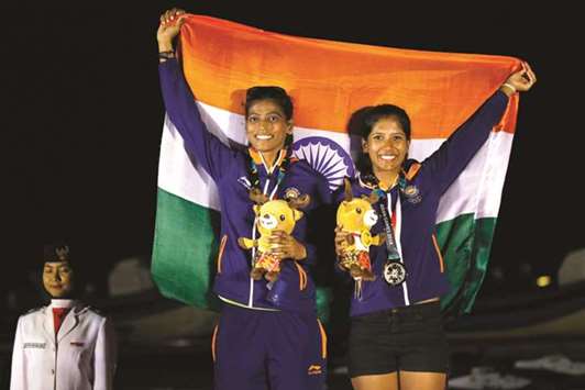 Silver medallists Gautham Varsha and Sweta Shervegar of India pose on the podium for 49er FX Women podium ceremony in Jakarta, Indonesia, yesterday. (Reuters)