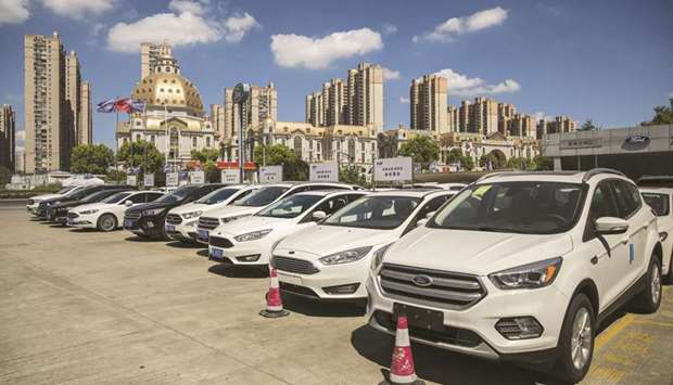 Ford Motor vehicles are on display at a Ford dealership in Shanghai. China has now either imposed or proposed tariffs on $110bn of US goods, representing the vast majority of Chinau2019s annual imports of American products.