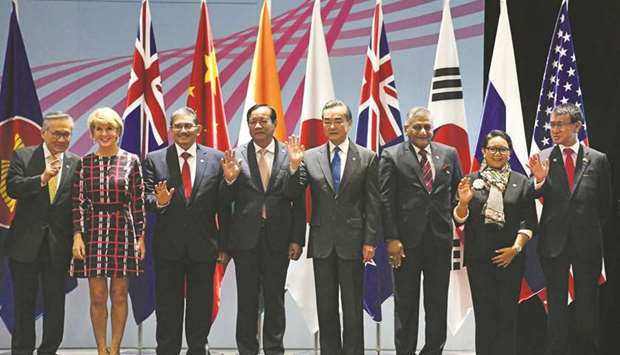 From left: Thailandu2019s Foreign Minister Don Pramudwinai, Australiau2019s Foreign Minister Julie Bishop, Malaysiau2019s Foreign Minister Saifuddin Abdullah, Cambodiau2019s Foreign Minister Prak Sokhon, Chinau2019s Foreign Minister Wang Yi, Indiau2019s External Affairs Minister Vijay Kumar Singh, Indonesiau2019s Foreign Minister Retno Marsudi and Japanu2019s Foreign Minister Taro Kono attend the 51st Association of Southeast Asian Nations Ministerial Meeting in Singapore yesterday. Leaders spoke out against protectionism, warning that it places the regionu2019s development in jeopardy.
