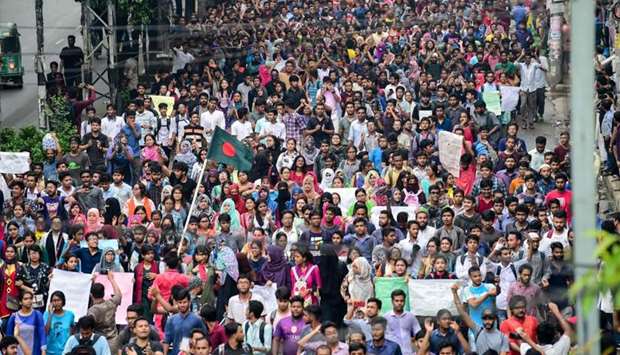 Bangladeshi students march along a street during a student protest in Dhaka. AFP