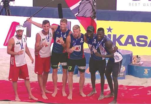 Qatar duo (right) of Cherif Younousse and Ahmed Tijan pose after their third-place finish in the five-star event of Beach Volleyball World Tour in Vienna yesterday.