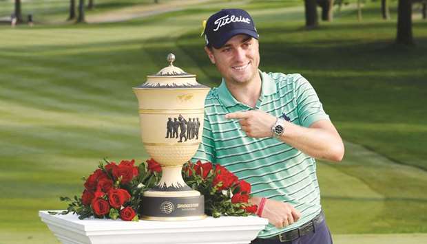 Justin Thomas poses with the Gary Player Cup after winning the WGC-Bridgestone Invitational. PICTURE: USA TODAY Sports