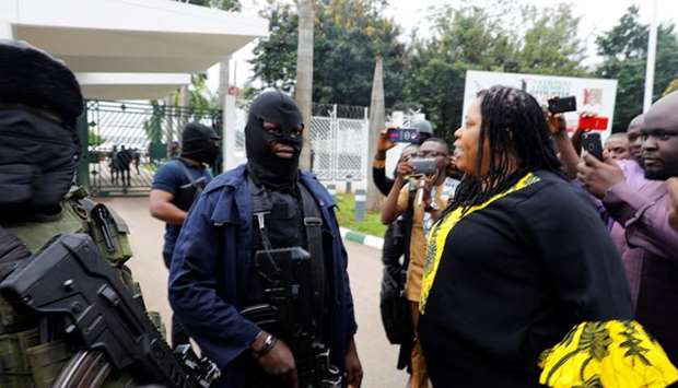 Members of security forces block the entrance of the National Assembly in Abuja, Nigeria