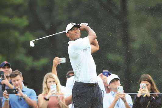 Tiger Woods of the United States plays a shot as fans look on during a practice round prior to the 2018 PGA Championship at Bellerive Country Club in St. Louis, Missouri. (Getty Images/AFP)