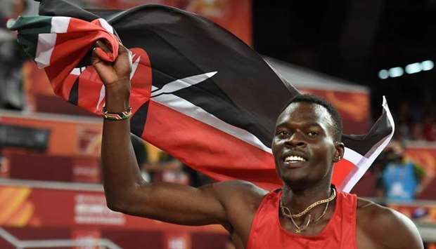 In this file photo taken on August 25, 2015 Kenya's Nicholas Bett celebrates winning the final of the men's 400 metres hurdles athletics event at the 2015 IAAF World Championships at the ,Bird's Nest, National Stadium in Beijing.