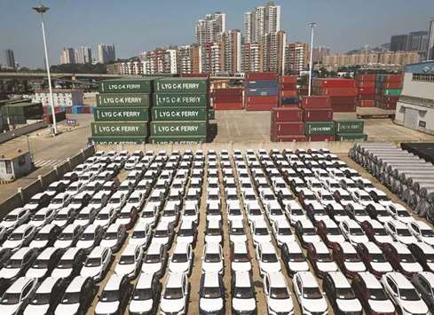Cars to be exported sit at a port in Lianyungang, Jiangsu province. Chinau2019s exports for July rose 12.2% year-on-year, showing little tariff impact for now and beating Juneu2019s 11.2% rise and analysts expectations in a Reuters poll for 10% growth.