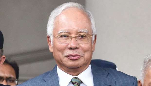 Malaysiau2019s former prime minister Najib Razak leaves Duta court complex in Kuala Lumpur yesterday.